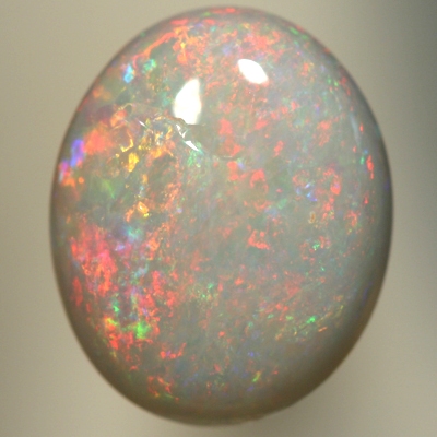 SOLID SEMI BLACK OPAL Pretty sparkles over a high dome
